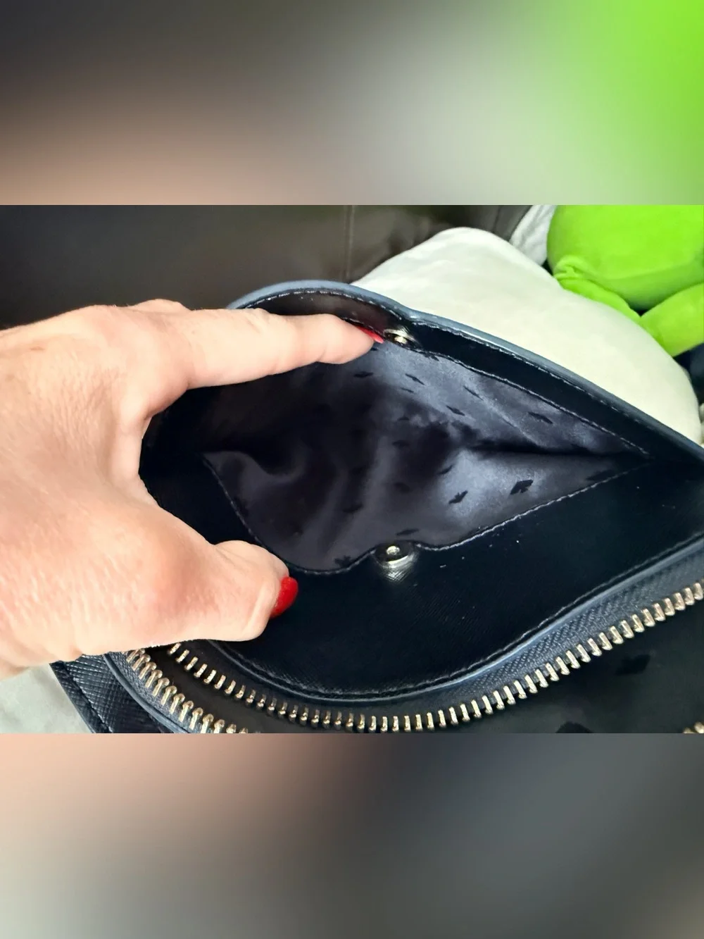 Kate Spade New York Payton Dome Crossbody in black saffiano leather.